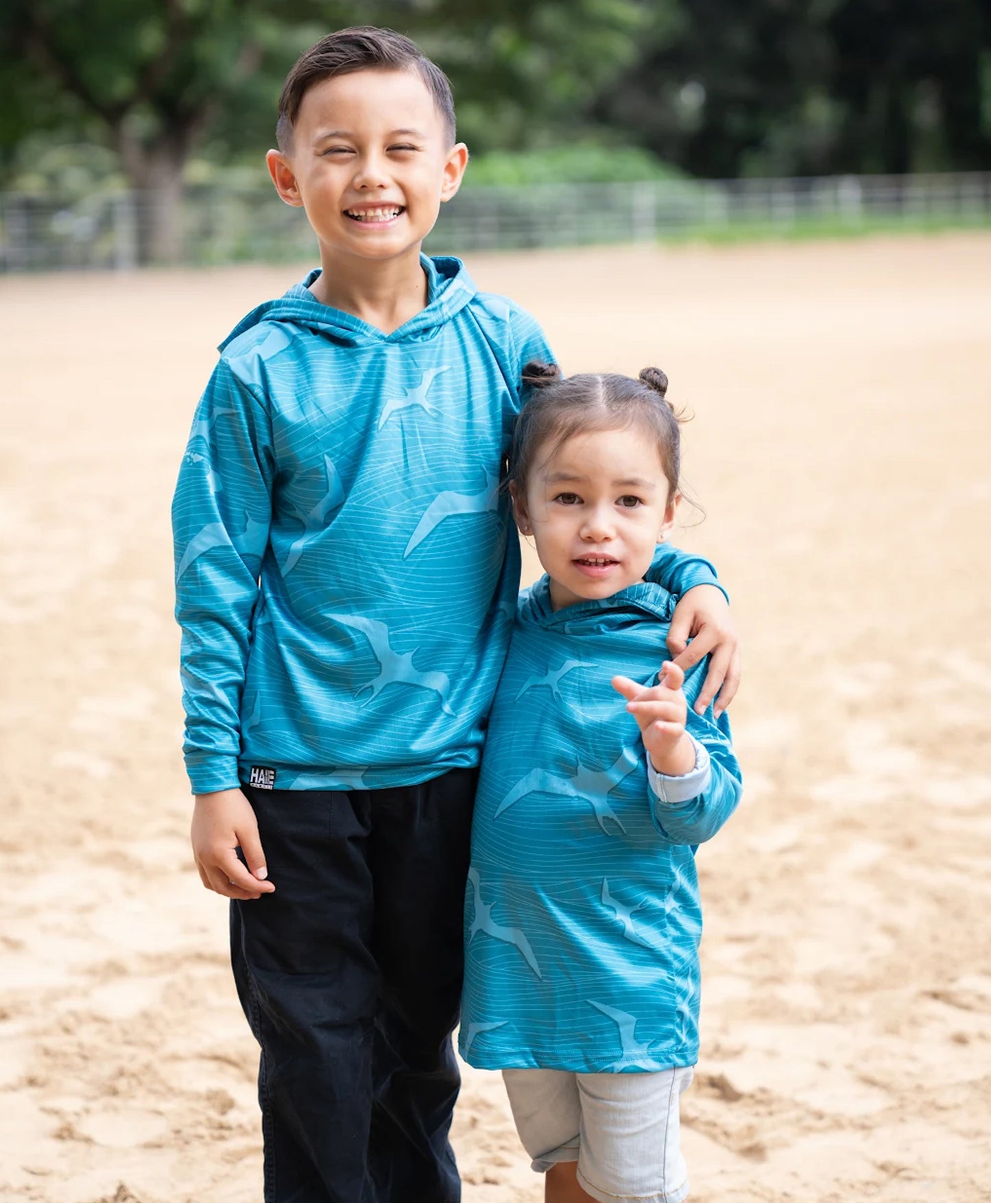 Na Iwa Waves Youth Hooded Longsleeve Drifit Teal