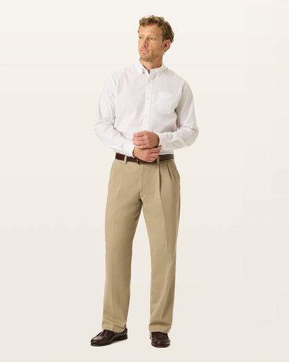 View of model wearing Khaki Easy Khakis, Pleated, Relaxed Fit.