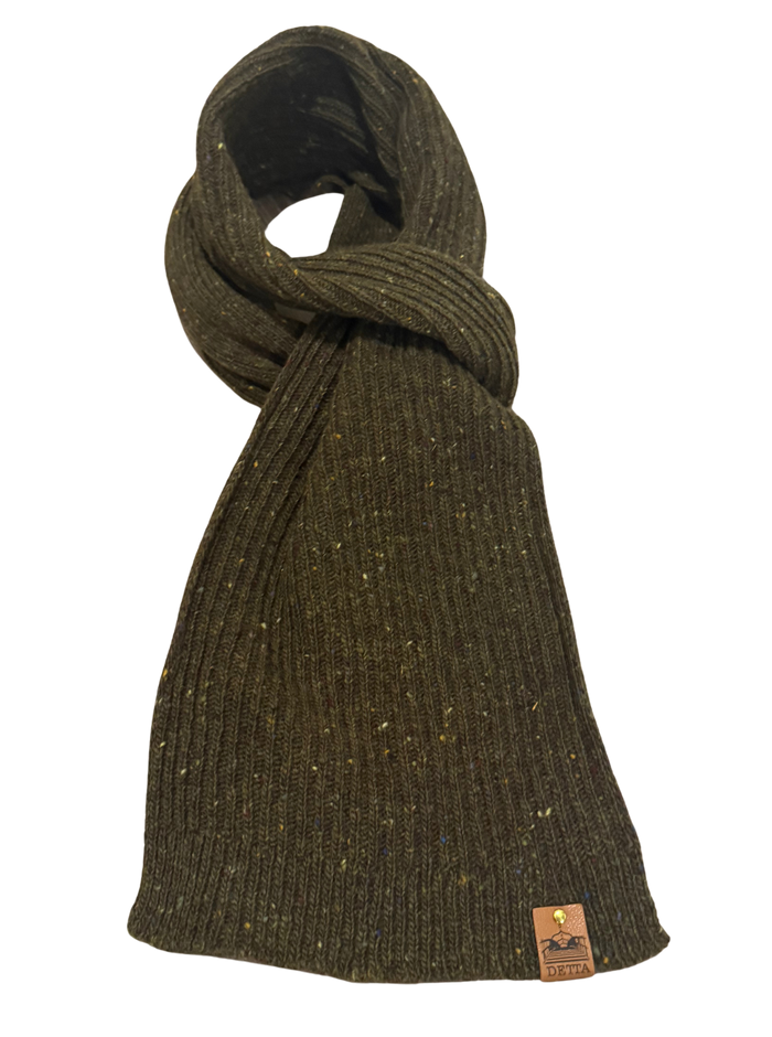 Dark green knitted scarf with a brand label on a white background