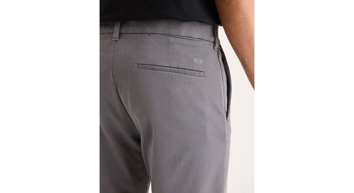 View of model wearing Car Park Grey Go Activeflex Chino, Slim Fit.