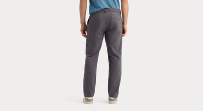 Back view of model wearing Boulevard Go Pro Pant with AceFlex, Slim Fit.