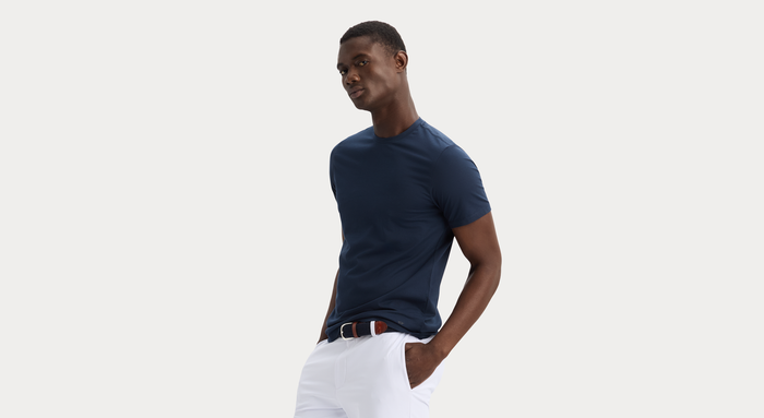 View of model wearing Navy Blazer Go Tee, Slim Fit.
