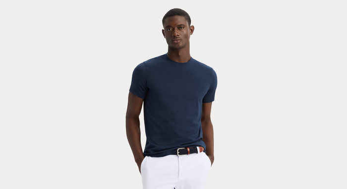 View of model wearing Navy Blazer Go Tee, Slim Fit.