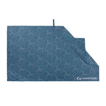 Lifeventure soft fibre travel towel in geometric print laid out flat