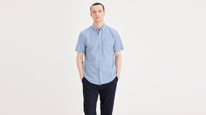 Front view of model wearing Deflt Signature Stain Defender Shirt, Classic Fit.