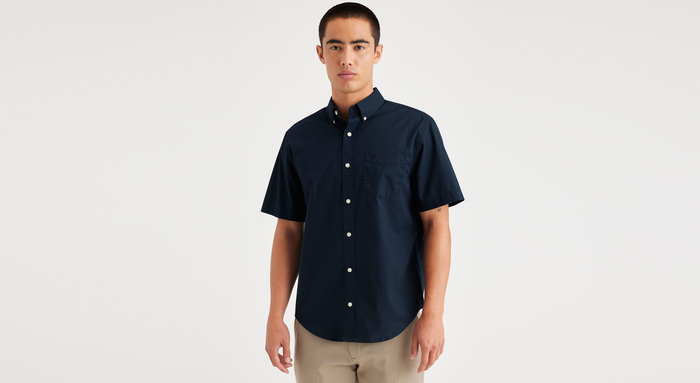 Front view of model wearing Navy Blazer Signature Stain Defender Shirt, Classic Fit.
