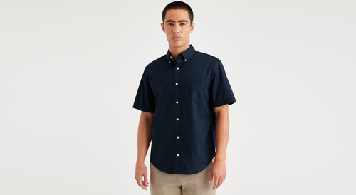 Front view of model wearing Navy Blazer Signature Stain Defender Shirt, Classic Fit.