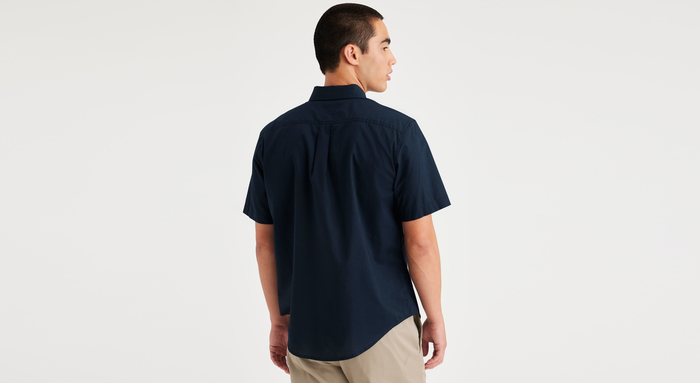Back view of model wearing Navy Blazer Signature Stain Defender Shirt, Classic Fit.