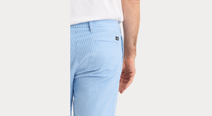 View of model wearing Vista Blue Ultimate 9.5" Shorts, Straight Fit.