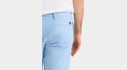 View of model wearing Vista Blue Ultimate 9.5" Shorts, Straight Fit.