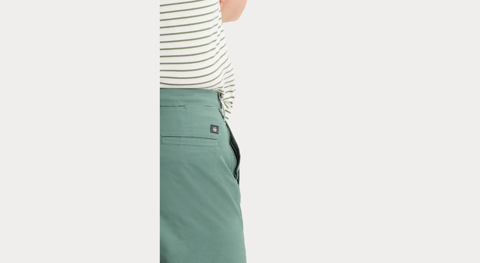 View of model wearing Duck Green Ultimate 9.5" Shorts, Straight Fit.