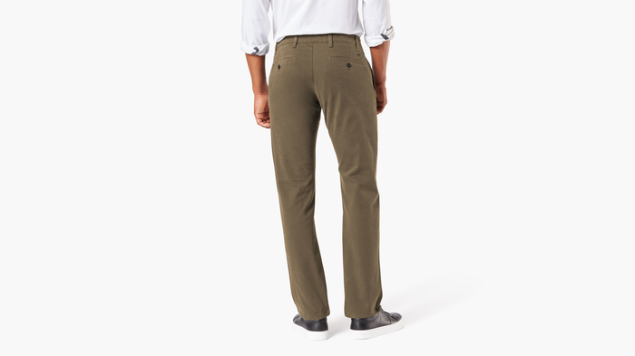 Back view of model wearing Leather Ultimate Chinos, Straight Fit.