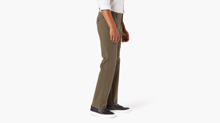 Side view of model wearing Leather Ultimate Chinos, Straight Fit.