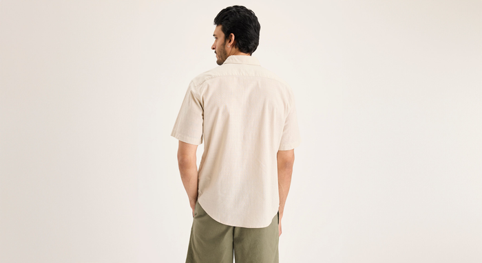 Back view of model wearing Sahara Khaki Ultimate Shirt, Regular Fit.