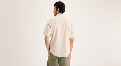 Back view of model wearing Sahara Khaki Ultimate Shirt, Regular Fit.
