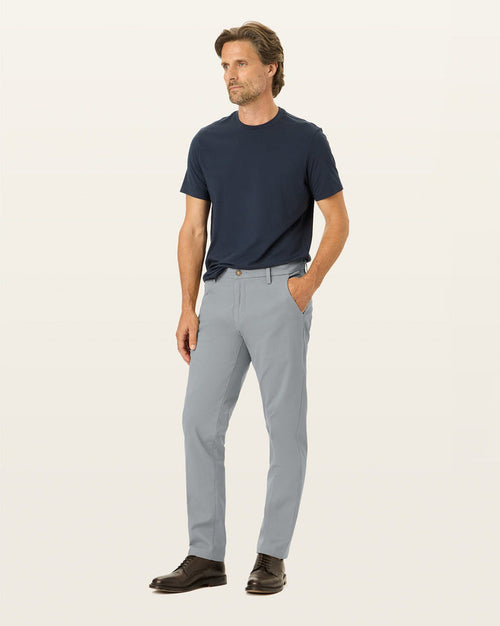 Front view of model wearing High-Rise Workday Khakis, Slim Fit.