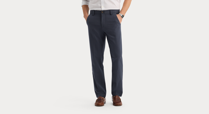 View of model wearing Harris India Ink Workday Khakis, Straight Fit.