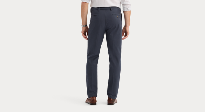 View of model wearing Harris India Ink Workday Khakis, Straight Fit.