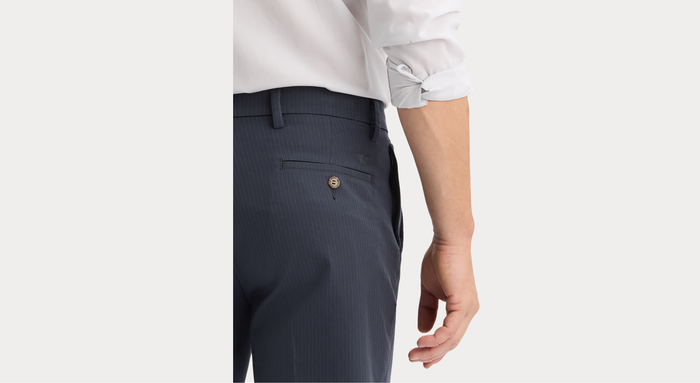 View of model wearing Harris India Ink Workday Khakis, Straight Fit.